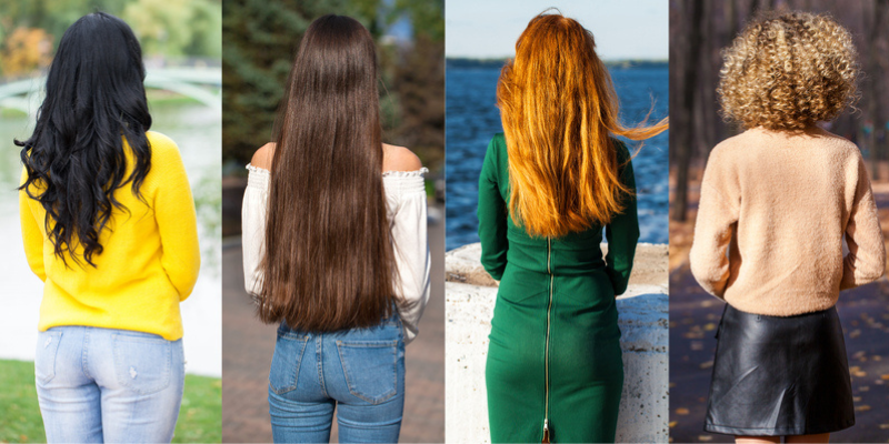 four women with different hair color and style standing with their backs turned.