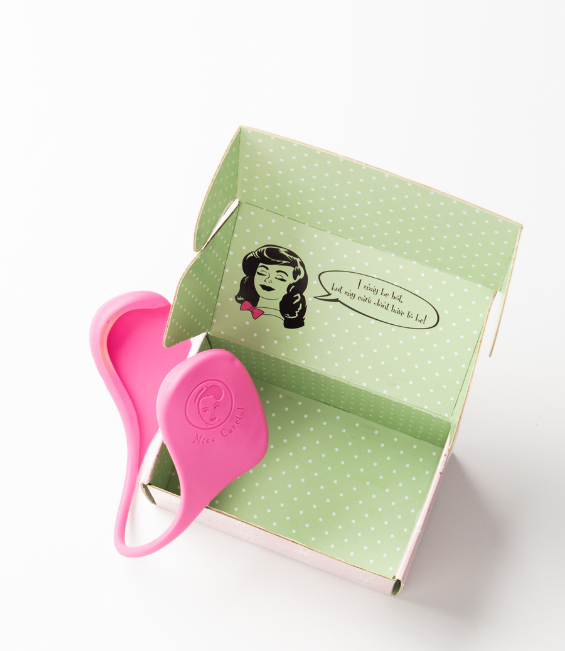 Miss Careful Pink color ear covers on the Miss Careful branded shipping box with lid open.